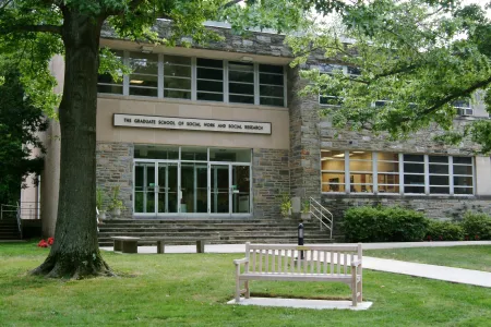 Graduate school of social work and social research main building in the spring time