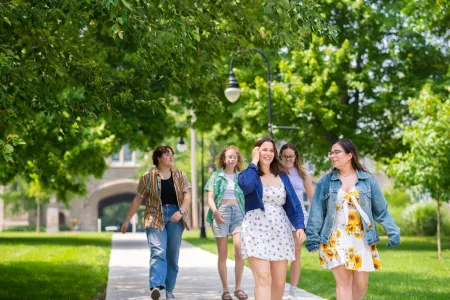 Students walking along the path to Erdman Dining Hall