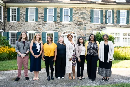 The Financial Aid team in front of Wyndham Alumnae House