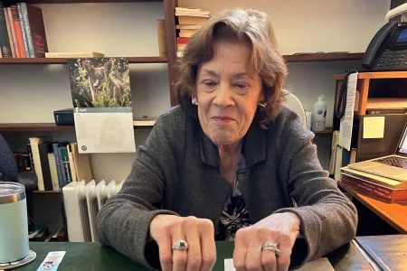 Professor showing her rings to the camera