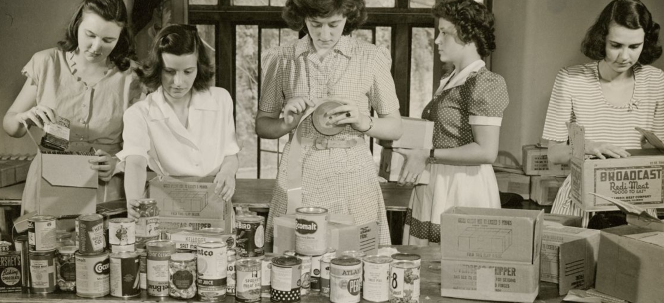 Students packing food for overseas shipment during WWII.