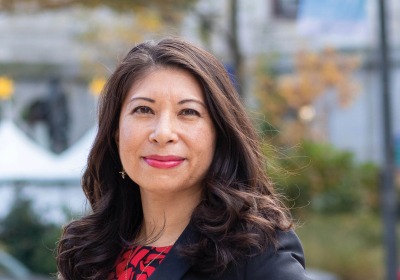 Portrait of Romana Lee-Akiyama wearing a black blazer