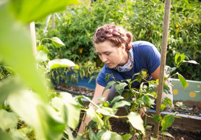 Hannah Cosgrove tending to a garden