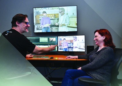 Sheena Joyce and partner Don Argott editing footage.