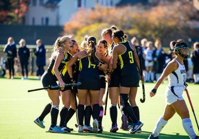 Field Hockey team hugs after winning Nov. 13 game