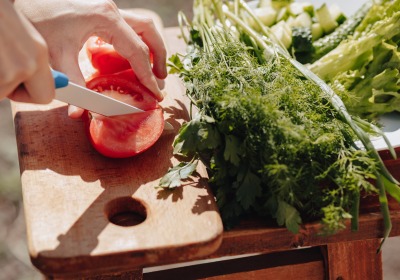 Photo of slicing a tomato