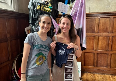 Kirsten Huskey and Amy Carroccia visiting Athena with the sonogram.