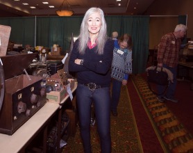 Barbara Kevles standing near vintage equipment