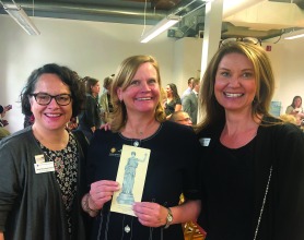 At a bill-signing to strengthen Colorado’s Maternal Mortality Review Committee, Flat Athena is on the scene with (left to right) Jacinta Montoya Price ’97, Rep. Meg (Kruizenga) Froelich ’85, and Sarah Davidon ’89. athena