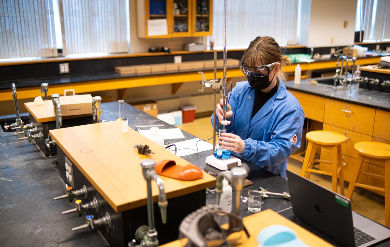STEMLA Fellow, Chelsea Freer prepares a lab as a lab assistant