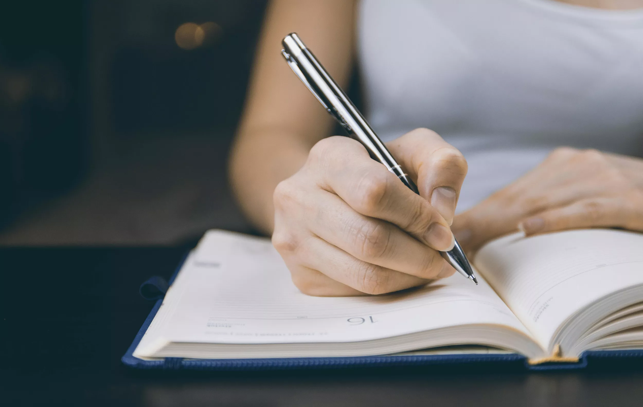 Writing in a notebook
