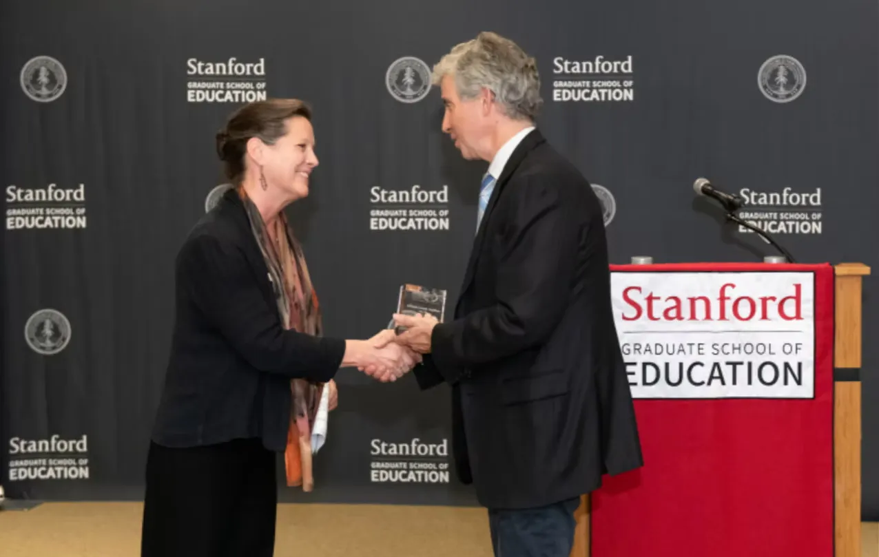Alison Cook-Sather receiving award from Stanford Graduate School of Education