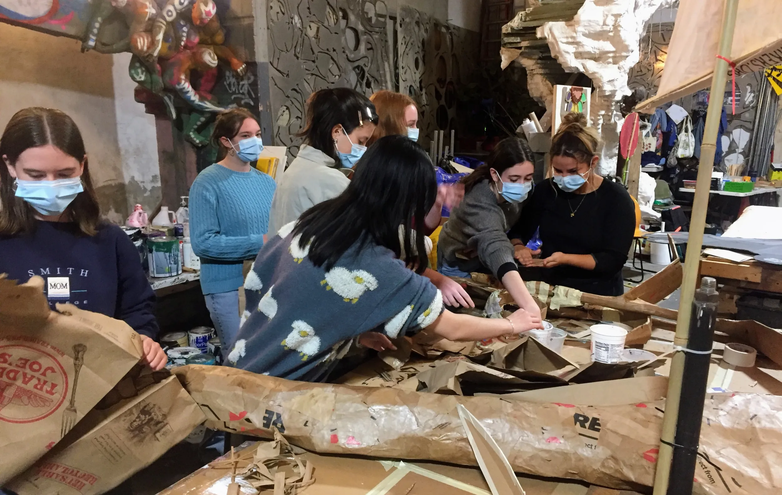 Photo of students creating puppet.