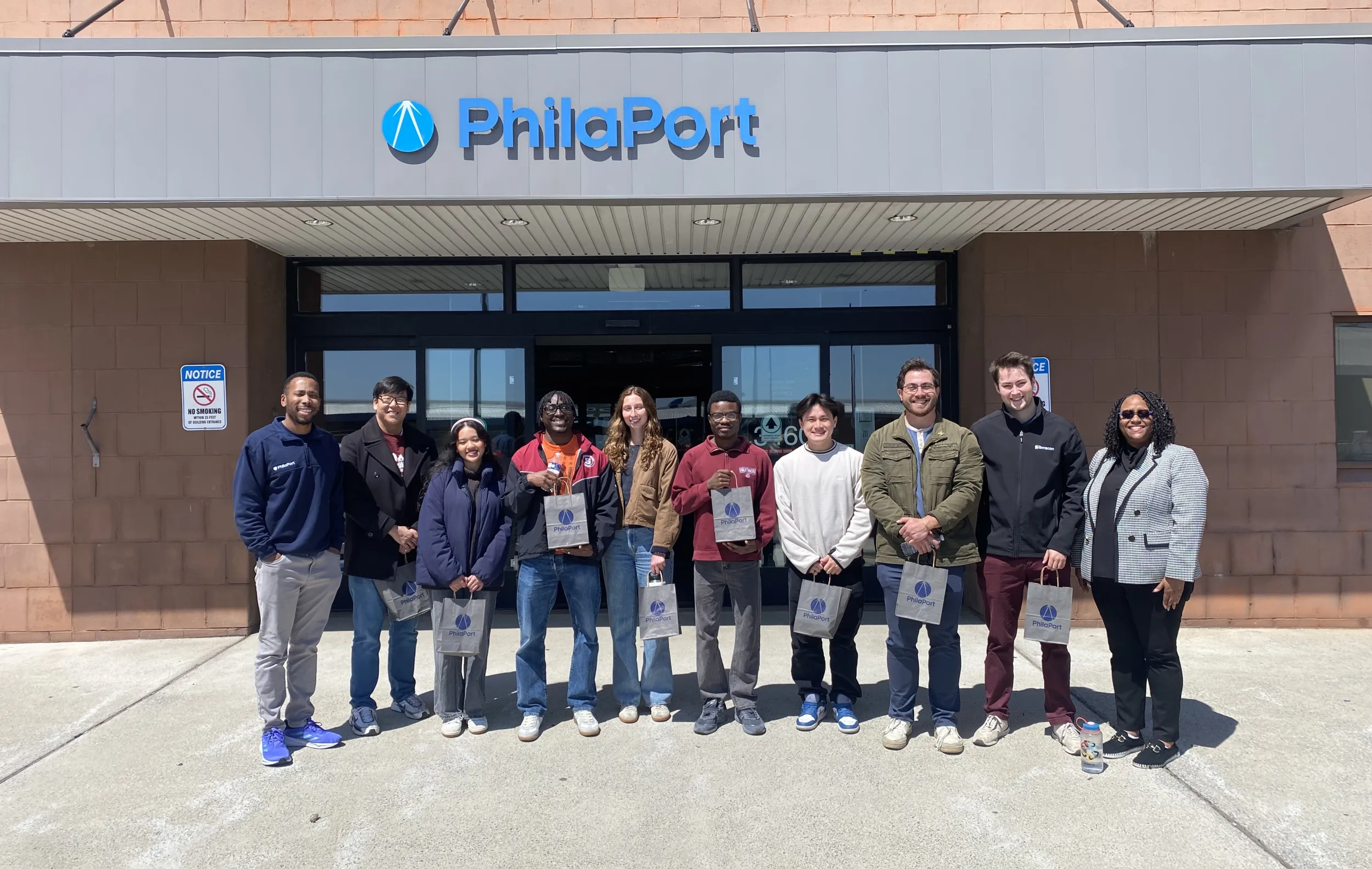 Photo of students standing outside of The Port of Philadelphia building