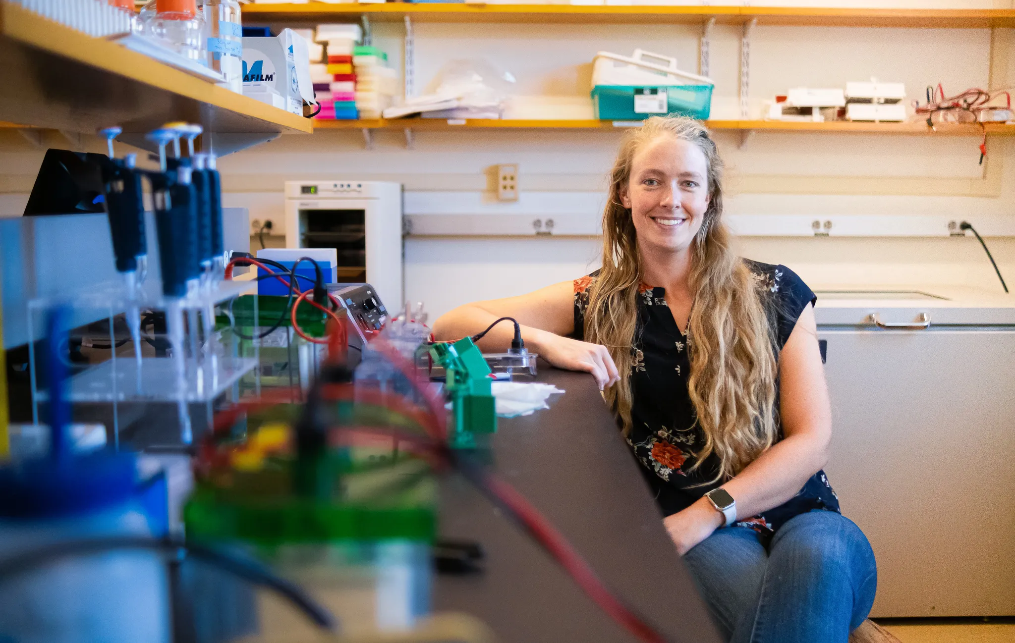 Ashlee Plummer lab portrait in research center