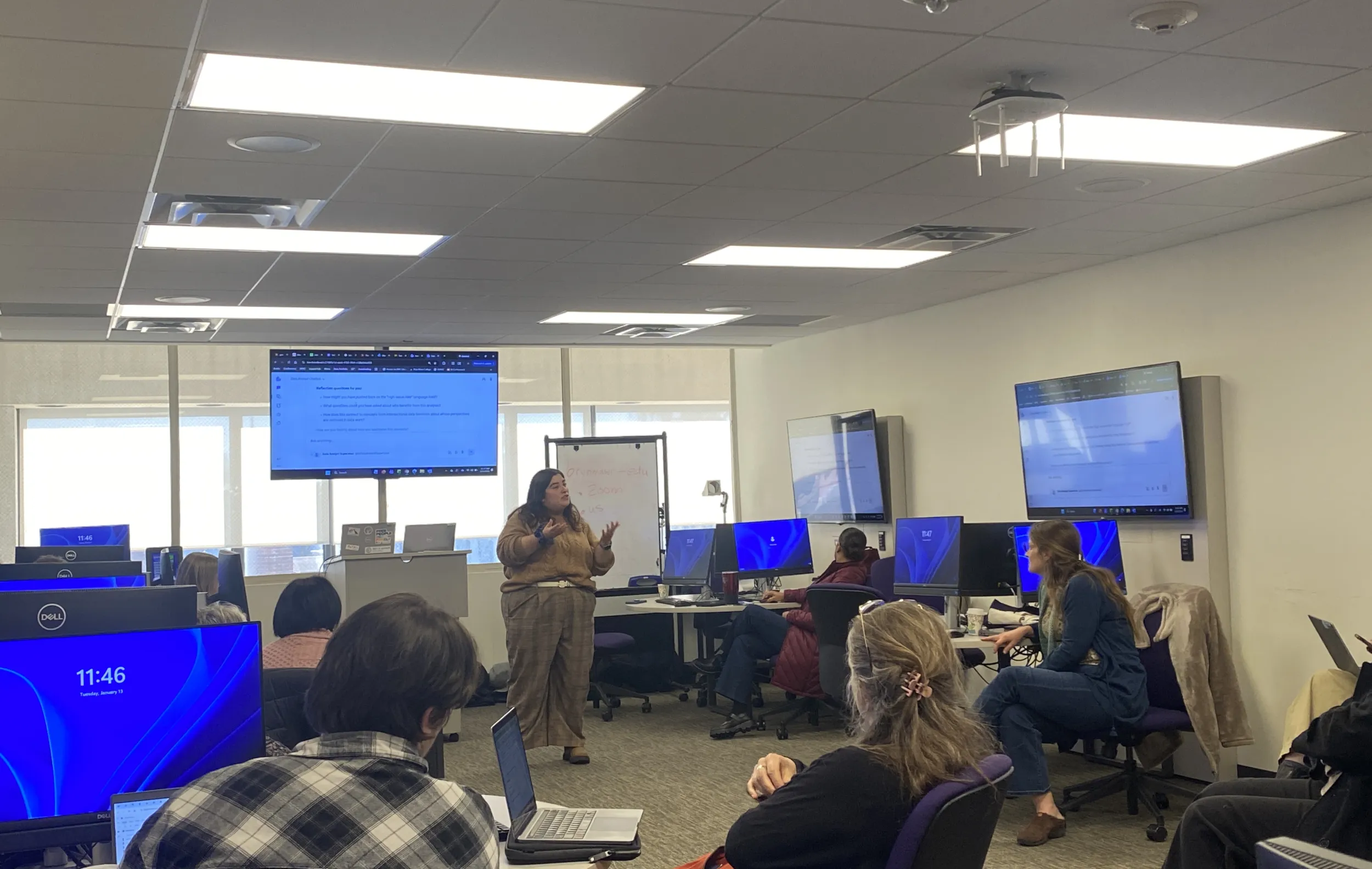 Alyssa Pivirotto standing behind a computer screen