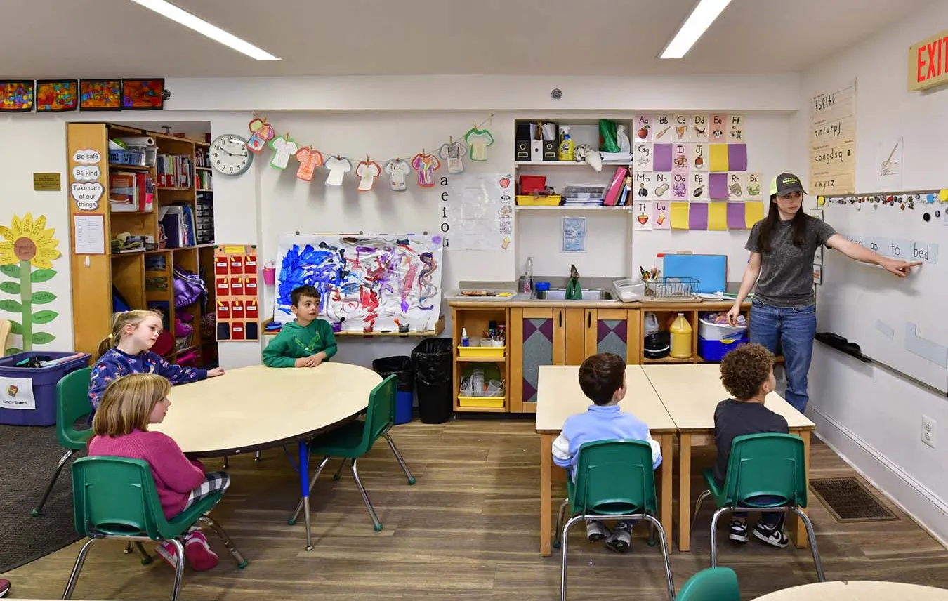 Teacher with students in classroom