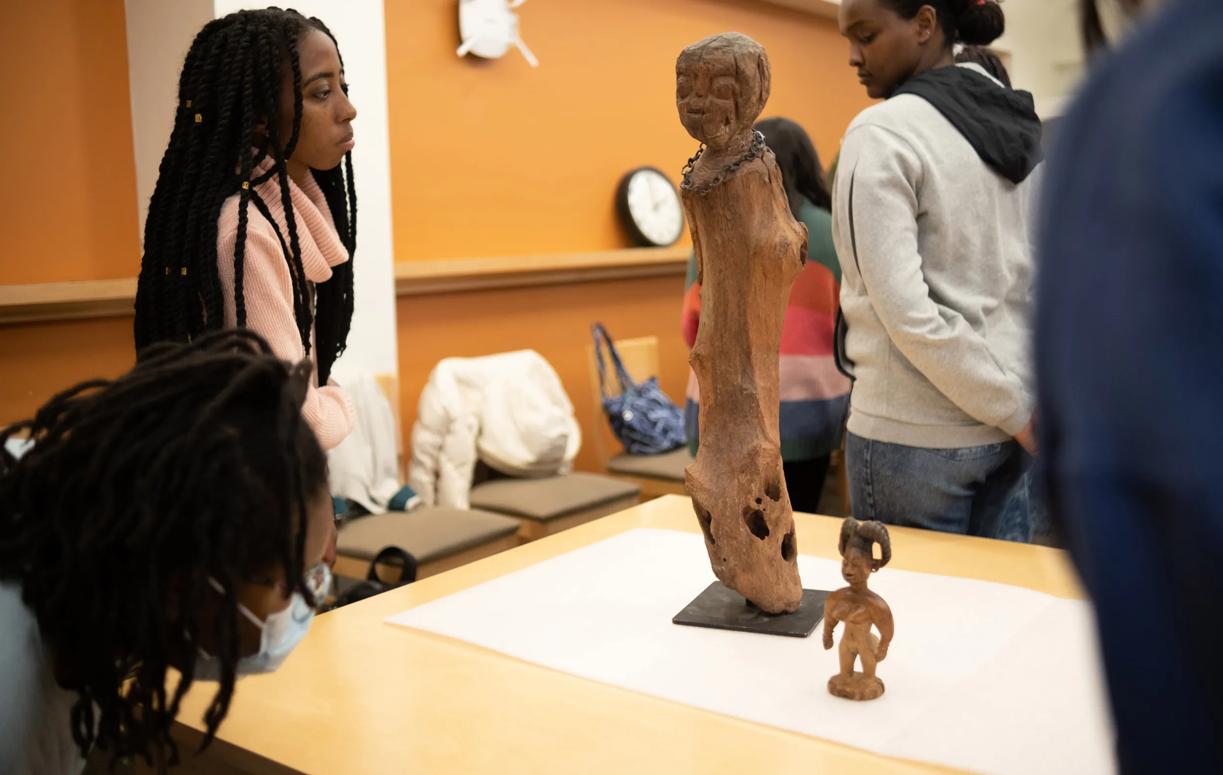 Bryn Mawr College History of Art students look at African Art from Special Collections