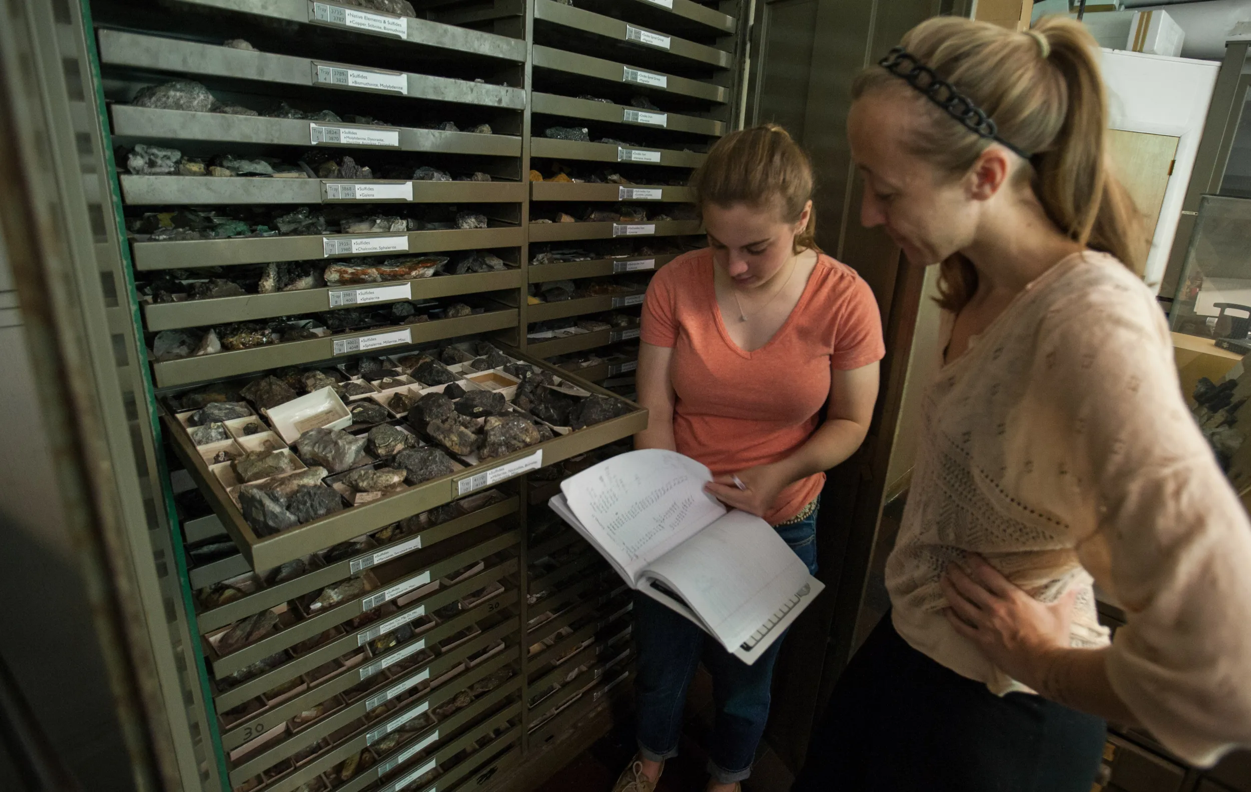 Two bryn mawr college students access mineral collection