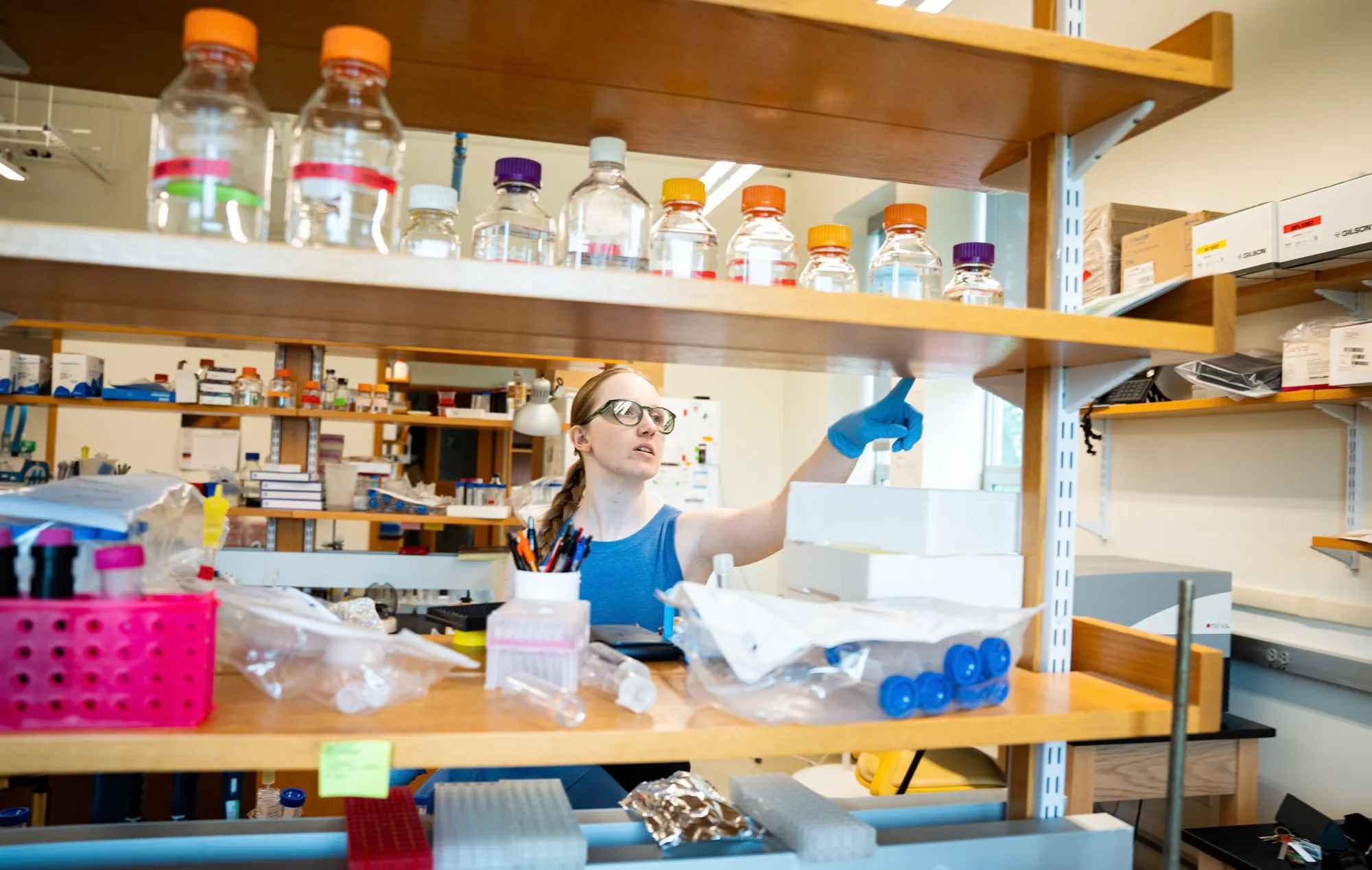 A biochemistry student works in the plummer lab