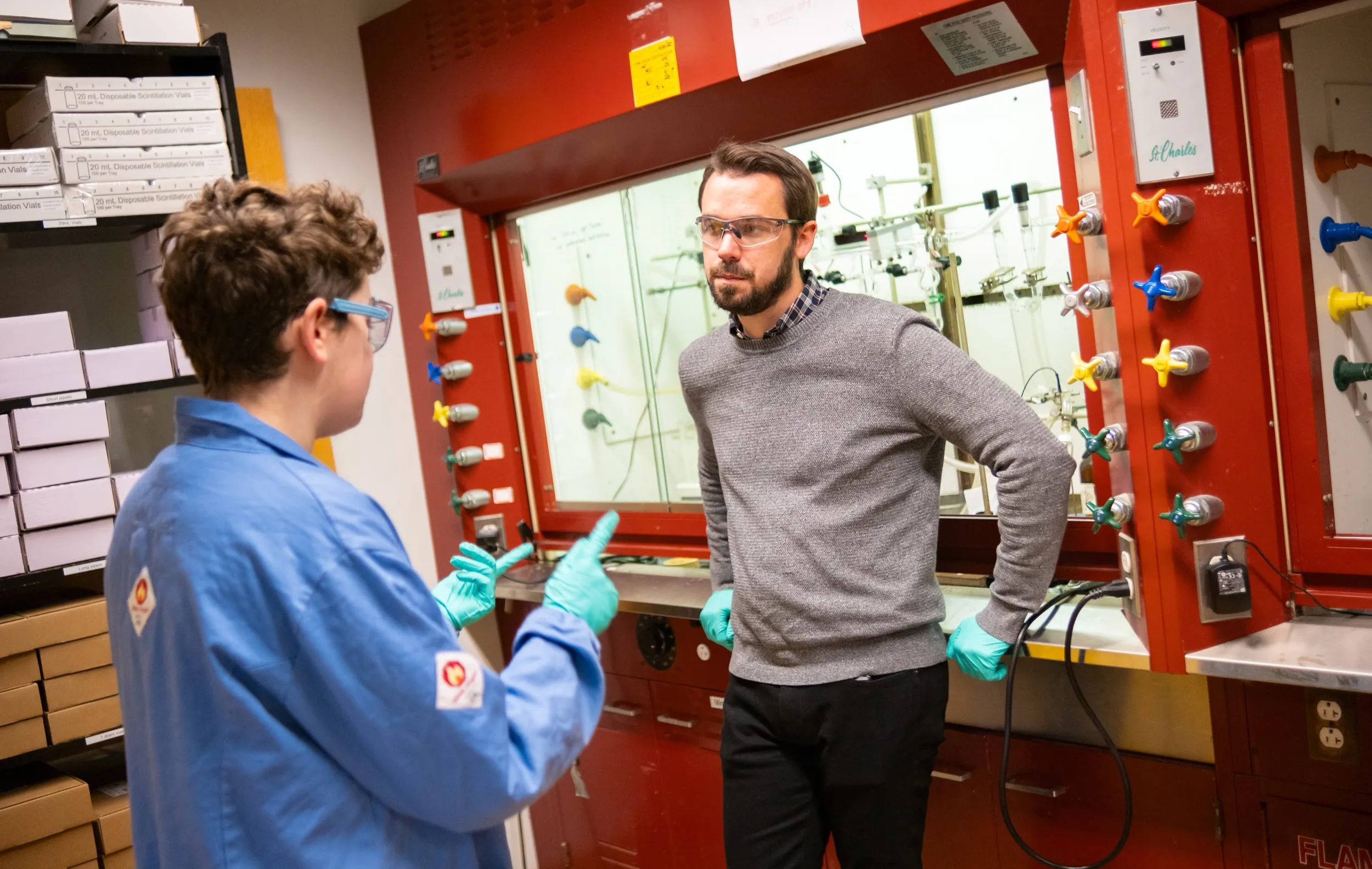 Chemistry student and Professor Patrick Melvin in the lab