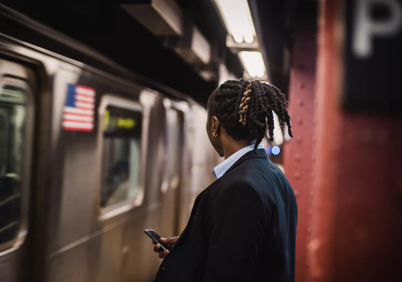 A student taking public transit for her part time master degree in social work