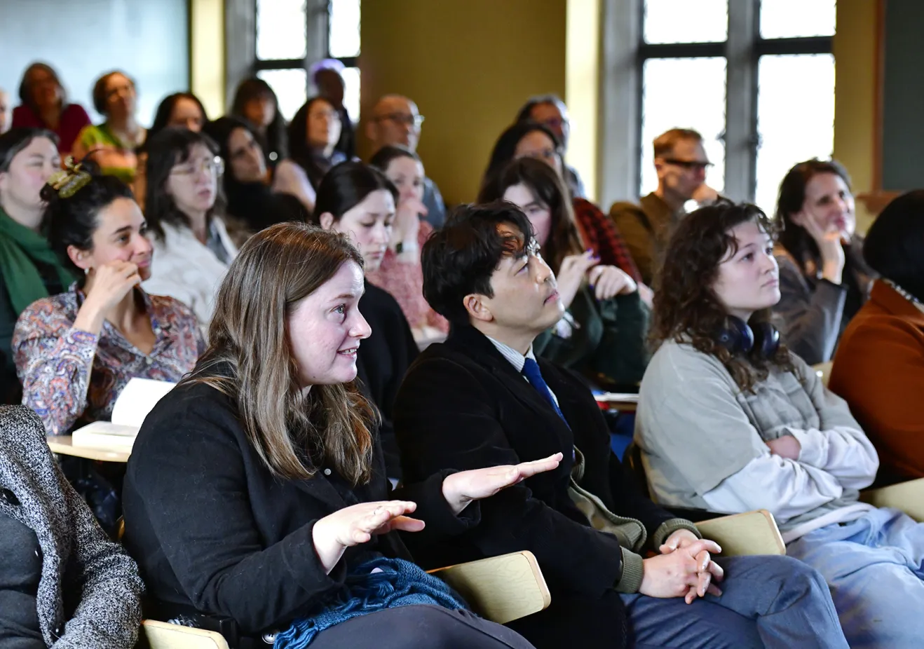 Our art history phd program's students sitting in a history of art lecture.