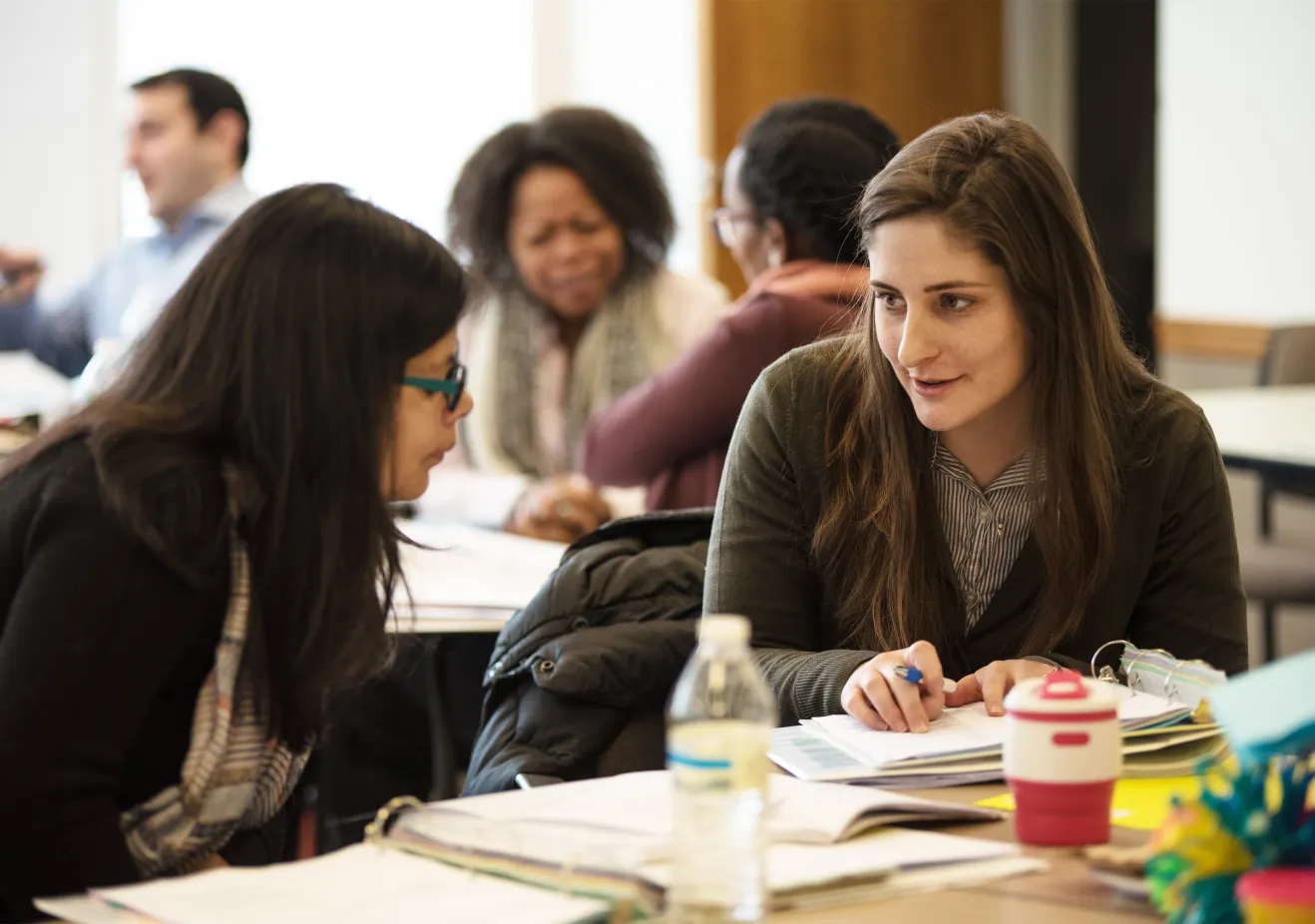 Students discussing earning their masters in social work degree
