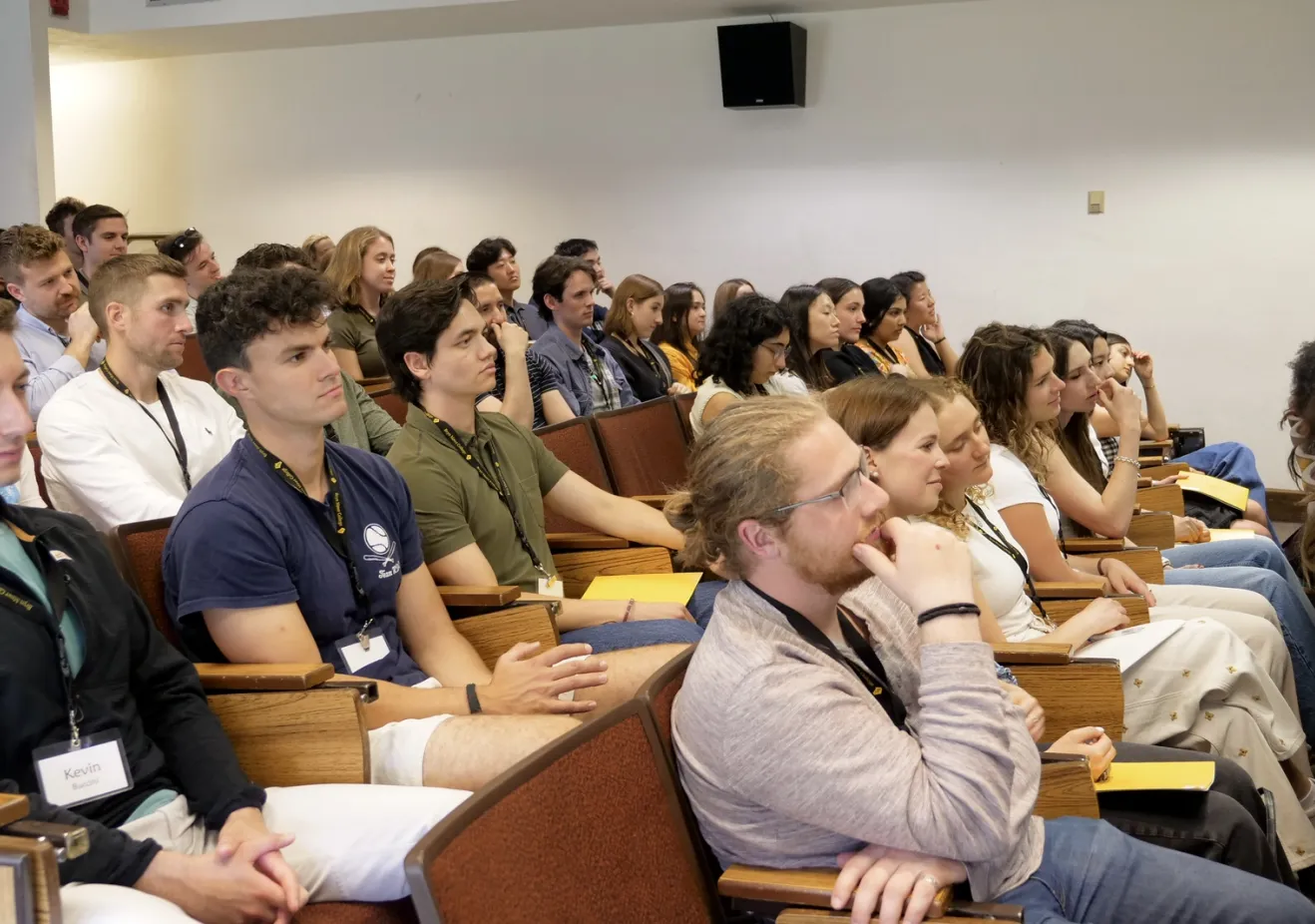 Students sitting in lecture hall for Postbac Orientation