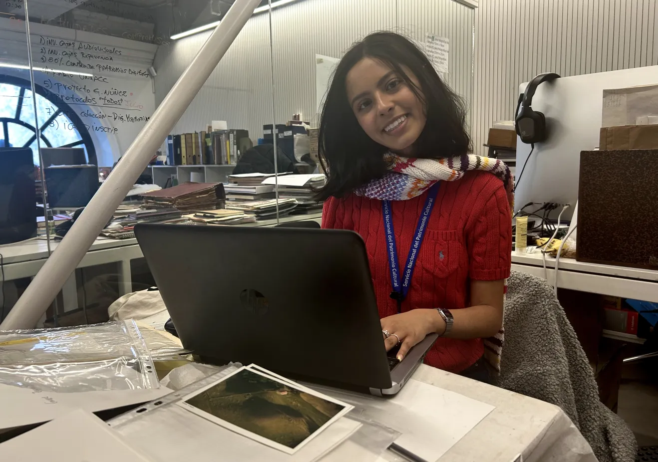 Sarah Elizabeth sitting and working at a computer