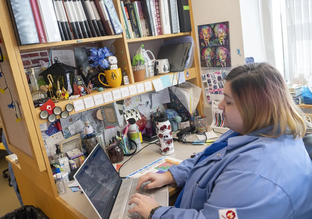Student on laptop in dorm room