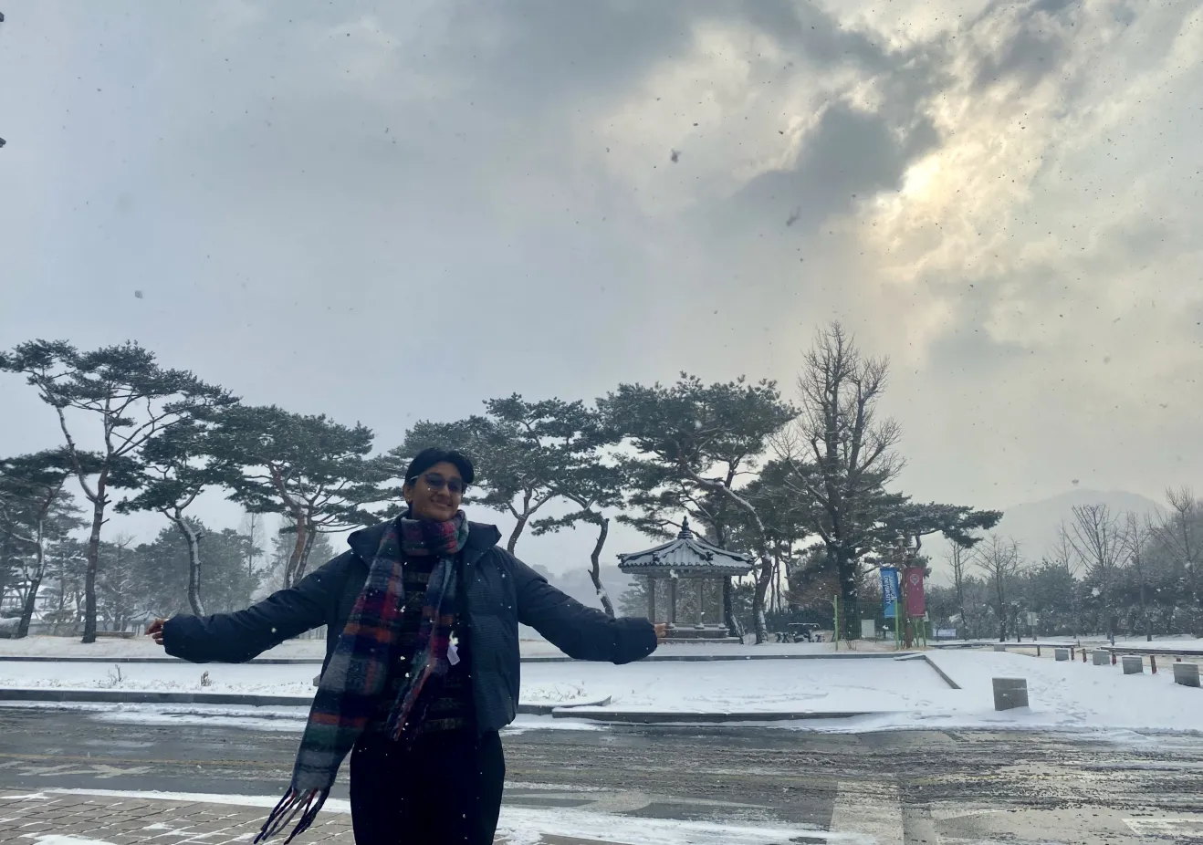 Roma standing in the snow in South Korea