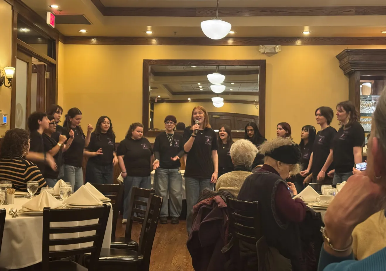 students singing at a D.C. restaurant
