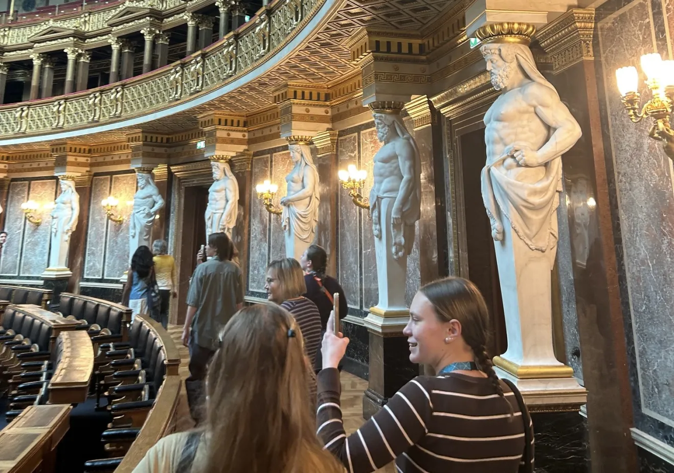 Our guided tour of the Austrian Parliament. This is us walking through the stunning Former House of Representatives Chamber.