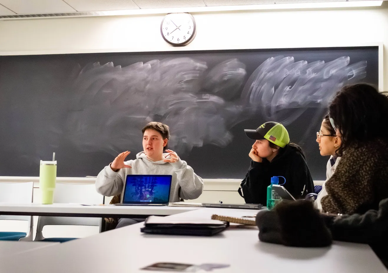 A Bryn Mawr College student presents to others