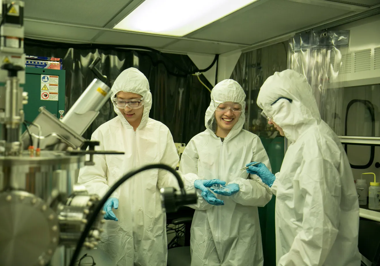 Three women physicists work in Nanomaterials and spintronics lab