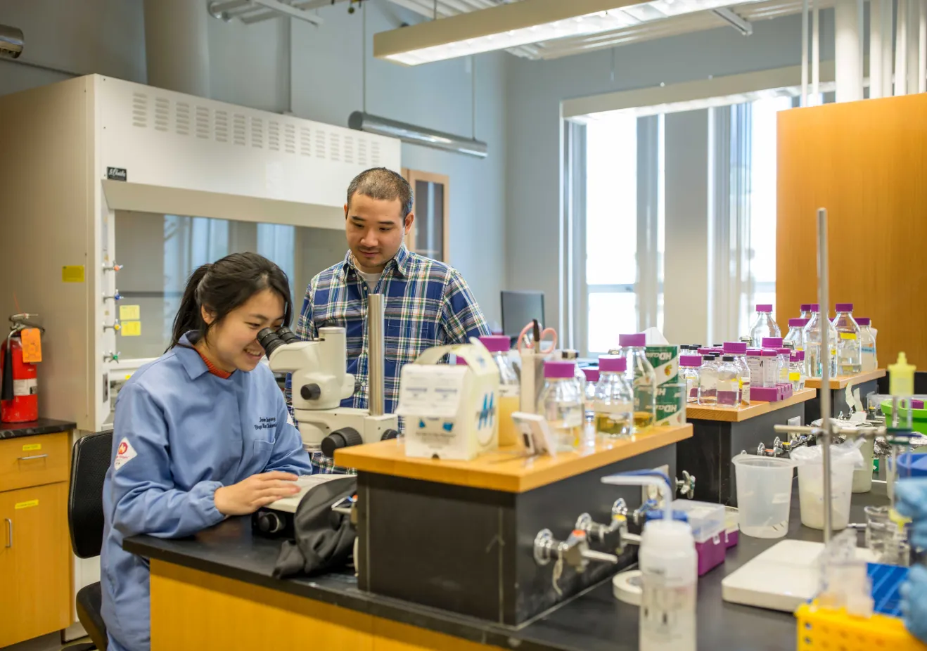 graduate chemistry student with faculty mentor in the lab