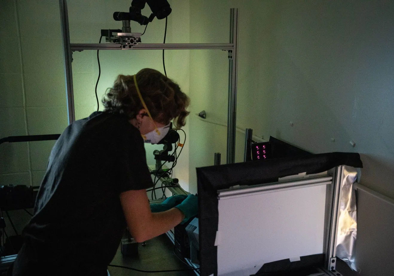 a biology student using research equipment