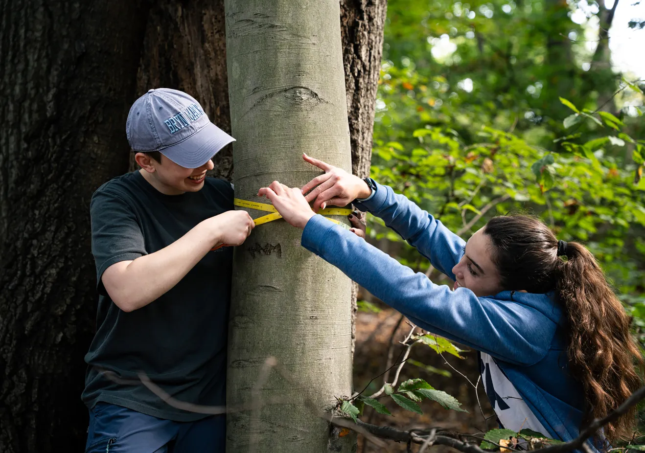 Two Bryn Mawr Biology students doing fieldwork