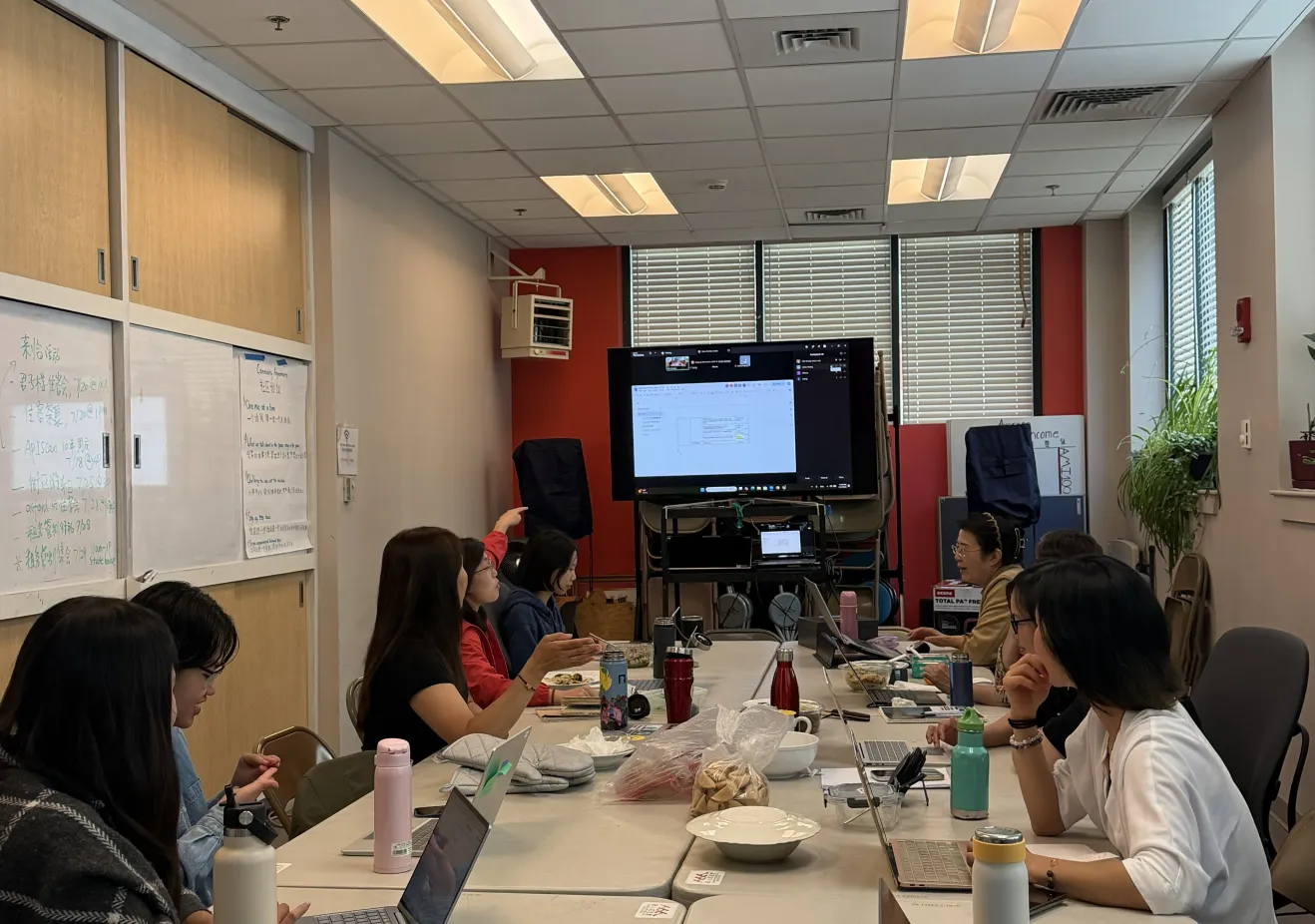 Wendy at a table with her coworkers