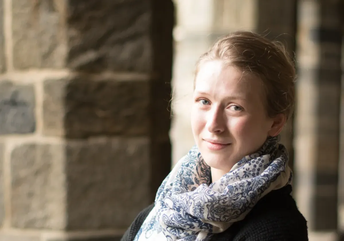 Stella Fritzell poses in the Cloisters