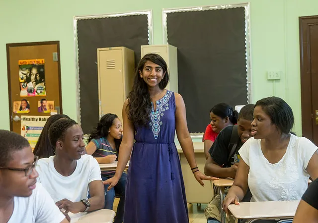 A Bryn Mawr student working in a classroom placement