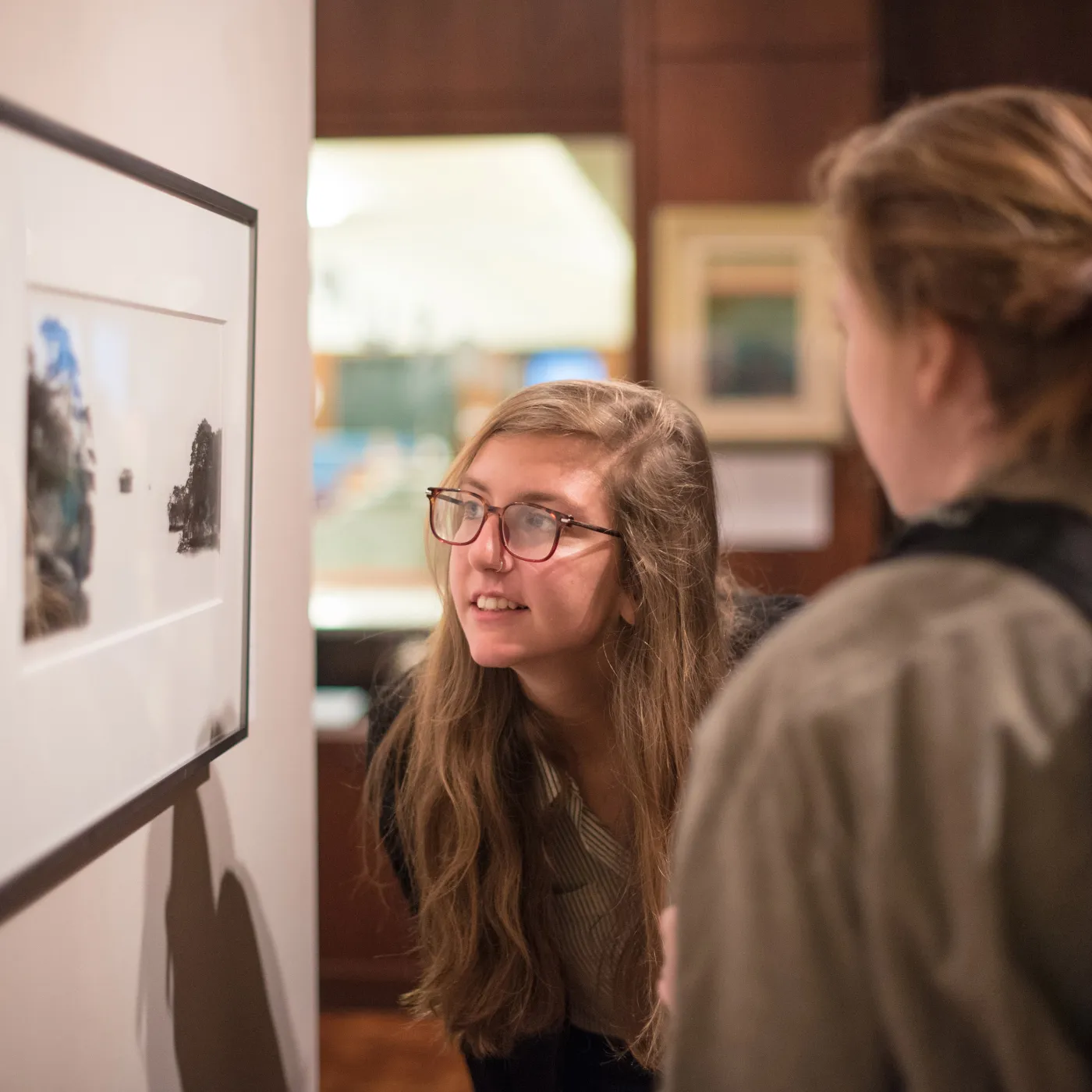Bryn Mawr art history students look at a painting