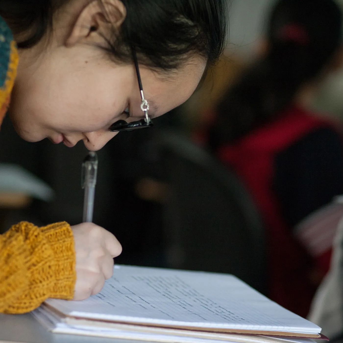 A student works in economics class