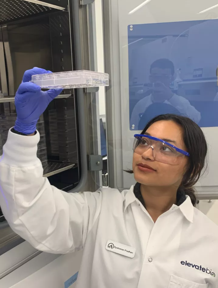 Pradhan doing internship research in a lab