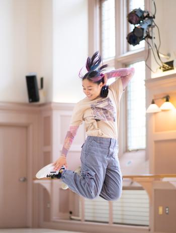 Kimiye Maeshiro jumping in the air