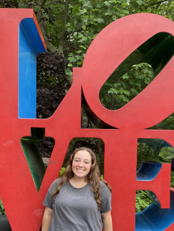 Elizabeth in front of the LOVE sign