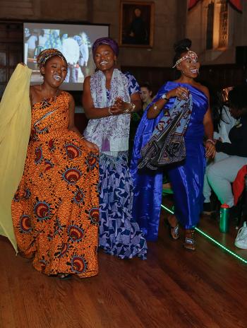  Joan Ndichu '21, Millicent Auma '21, and Lyncy Nyandoche '21 in Kenyan wedding attire. 