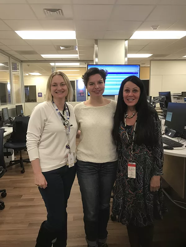 Toni Ekerdt '19 (center), Jan (Hangen) Walker '79, and Melanie Cree Green ’99. All three are biology majors and green lanterns.