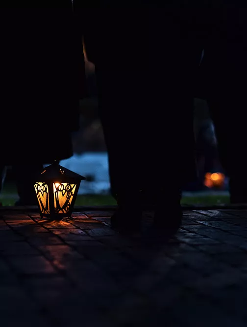 A lit lantern at Lux Doctorum